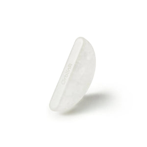 Orblink Clear Quartz ritual stone with engraved logo on white background