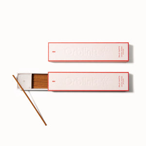 A boxed set of natural Palo Santo (Holy Wood) sticks, packaged for cleansing and energy purification.